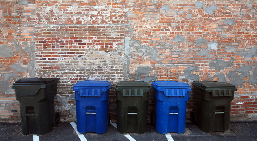 different bins used in a commercial recycling program